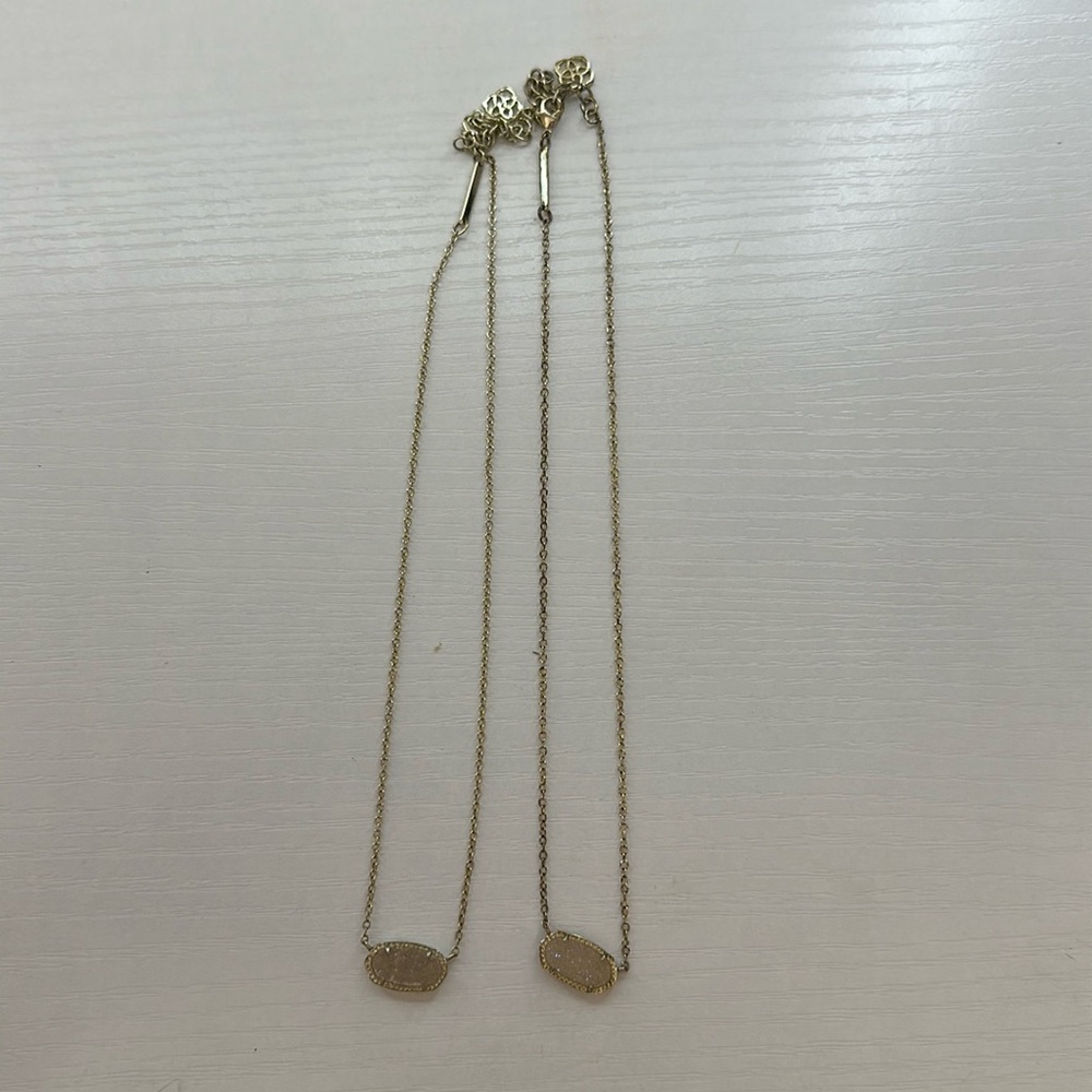 TWO Kendra Scott Elisa gold necklace